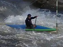 Slalom Practice. Paddling a C1, decked canoe.