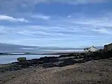 'Diving Rock', on the left of the image, often used to jump into the sea at high tide