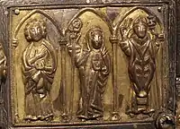 Lower right hand panel, with an abbess and two clerics or saints, possibly the three Irish patron saints,  Columba, St Brigid and St Patrick.