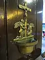 A brass stoup for holy water