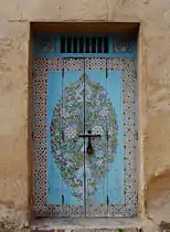 An ornately painted door in the kasbah, near the museum