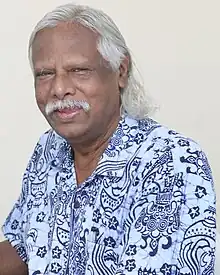 Chowdhury at a Jatiya Oikya Front event