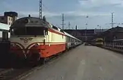 Dr13 no. 2302  seen here at Helsinki railway station on 15 June 1986, is at the head of the 18:02 from Helsinki service to Turku.