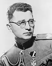 a black and white photograph of Draža Mihailović wearing glasses and Yugoslav Army dress uniform