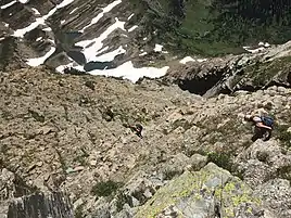 Climbers descend from the ridge of Dragons Tail