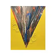 A painting of a yellow rectangle divided by a multicolored, downward-facing triangle. An embossed image of a skull is bisected, with each half falling on one side of the triangle.