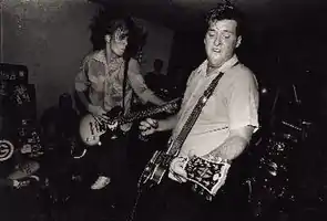 Rick Froberg (left) and John Reis (right) performing with Drive Like Jehu