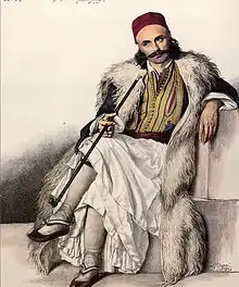 Vasilis Goudas, adjutant of Markos Botsaris. A hand-coloured lithograph by Louis Dupré in his travel book, Voyage à Athènes et à Constantinople, 1820s.