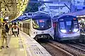 MLR E110-E61 and R-Train D091 at Kowloon Tong Station