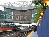 The station as it appeared as it was being reconstructed to allow for a transfer to AirTrain JFK in 2003; note the temporary platform (left)