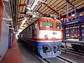 A retired TCDD E52500 inside the locomotive shops.