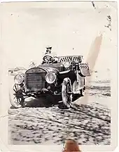 E.A. Smith motoring near her desert home at Pearce, AZ in her Rambler Touring Car, circa 1907