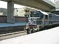 3801 class EMD G22W diesel locomotive no. 3977 passing through El Giza Station in 2008