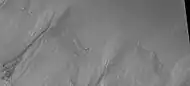 Close-up of gully aprons showing they are free of craters; hence very young.  Location is Phaethontis quadrangle.  Picture was taken by HiRISE under HiWish program.