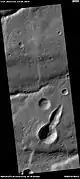 Pointed crater, as seen by HiRISE under HiWish program  Impacting object may have struck at a low angle.