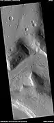 Wide view of flow moving down valley, as seen by HiRISE under HiWish program