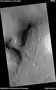 Two glaciers interacting, as seen by HiRISE under HiWish program The one on the left is more recent and is flowing on top of the other one.