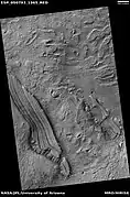 Tilted layers, as seen by HiRISE under HiWish program  Location is Hellas quadrangle.