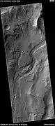 Channel, as seen by HiRISE under HiWish program  Streamlined shapes are indicated with arrows.