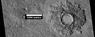 Pedestal crater, as seen by HiRISE under HiWish program  The crater's ejecta protected the underlying ground from eroding.