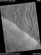 Channels that may have been made by the backwash of tsunamis in an ocean  Image is from HiRISE under the HiWish program.