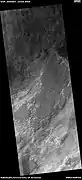 Floor features in Hellas Planitia, as seen by HiRISE under HiWish program