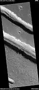 Troughs, as seen by HiRISE under HiWish program  Layers are also visible in the image.