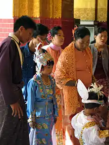 Image 12An ear-piercing ceremony at Mahamuni Buddha in Mandalay. (from Culture of Myanmar)