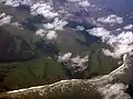 Aerial view of Beachy Head, with Eastbourne visible at the top of the photo.