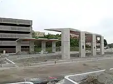 Concrete bus shelters under construction