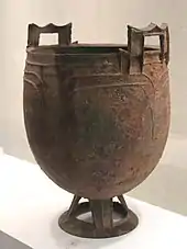 A cauldron with simple geometric motifs