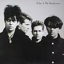 An album cover showing a black and white photograph of four men. Echo & the Bunnymen is written in the top-right corner of the cover in black text.