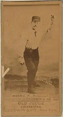 A baseball card featuring a player wearing a white shirt and dark pants throwing a baseball. The bottom of the card reads "MORRIS, P., Pittsburgh Copyrighted by GOODWIN & CO. 1888"