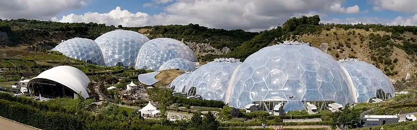 Image 9Eden ProjectPhoto credit: Jürgen MaternPanoramic view of the geodesic dome structures of the Eden Project, a large-scale environmental complex near St Austell, Cornwall, England. The project was conceived by Tim Smit and is made out of hundreds of hexagons (transparent biomes made of ETFE cushions) that interconnect the whole construction together. The project took 2½ years to construct and opened to the public in March 2001.More featured pictures