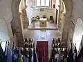 Inside of the church with the Robert Schuman grave and all the flags of the European Union countries