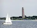 Laboe Tower seen from water with submarine museum U-995 at beach