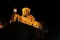 The church lit up at night