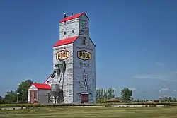 Grain elevator in Elbow, Note: original Saskatchewan Wheat Pool logo