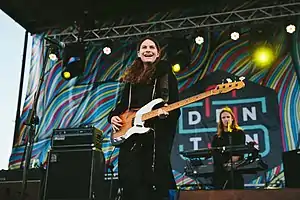 Sumner performing in 2015