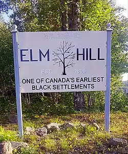 Elm Hill entrance sign in September, 2018