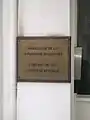 Former plaque outside the High Commission in English and French