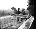 Thiollier's daughter Emma [fr], a sculptor and painter, working at Notre Dame (1907).