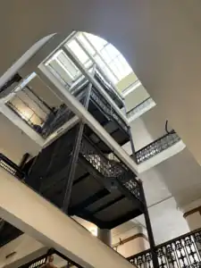 Second floor looking up the staircase and atrium