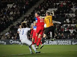 Abby Wambach, a retired player known for scoring header goals