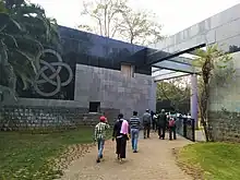 entrance with logo of the institute inscribed on the let wall