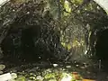 Inside the mine.  The main adit heads straight on, with the longest tunnel branching off to the right