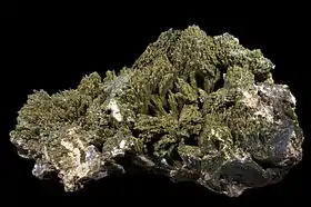 Image 12Epidote often has a distinctive pistachio-green colour. (from Mineral)