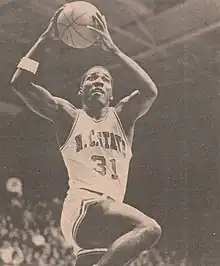 Basketball player with a ball in hand