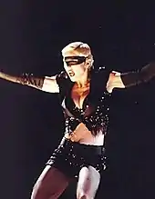 Madonna wearing black shorts and looking to her right. Her arms are open and a headset microphone to her mouth..mw-parser-output cite.citation{font-style:inherit;word-wrap:break-word}.mw-parser-output .citation q{quotes:"\"""\"""'""'"}.mw-parser-output .citation:target{background-color:rgba(0,127,255,0.133)}.mw-parser-output .id-lock-free a,.mw-parser-output .citation .cs1-lock-free a{background:url("//upload.wikimedia.org/wikipedia/commons/6/65/Lock-green.svg")right 0.1em center/9px no-repeat}.mw-parser-output .id-lock-limited a,.mw-parser-output .id-lock-registration a,.mw-parser-output .citation .cs1-lock-limited a,.mw-parser-output .citation .cs1-lock-registration a{background:url("//upload.wikimedia.org/wikipedia/commons/d/d6/Lock-gray-alt-2.svg")right 0.1em center/9px no-repeat}.mw-parser-output .id-lock-subscription a,.mw-parser-output .citation .cs1-lock-subscription a{background:url("//upload.wikimedia.org/wikipedia/commons/a/aa/Lock-red-alt-2.svg")right 0.1em center/9px no-repeat}.mw-parser-output .cs1-ws-icon a{background:url("//upload.wikimedia.org/wikipedia/commons/4/4c/Wikisource-logo.svg")right 0.1em center/12px no-repeat}.mw-parser-output .cs1-code{color:inherit;background:inherit;border:none;padding:inherit}.mw-parser-output .cs1-hidden-error{display:none;color:#d33}.mw-parser-output .cs1-visible-error{color:#d33}.mw-parser-output .cs1-maint{display:none;color:#3a3;margin-left:0.3em}.mw-parser-output .cs1-format{font-size:95%}.mw-parser-output .cs1-kern-left{padding-left:0.2em}.mw-parser-output .cs1-kern-right{padding-right:0.2em}.mw-parser-output .citation .mw-selflink{font-weight:inherit}"Na órbita dos astros". Veja (in Portuguese). October 6, 1993. Archived from the original on January 1, 2010. Retrieved December 20, 2012.