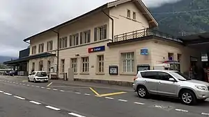 Three-story building with gabled roof